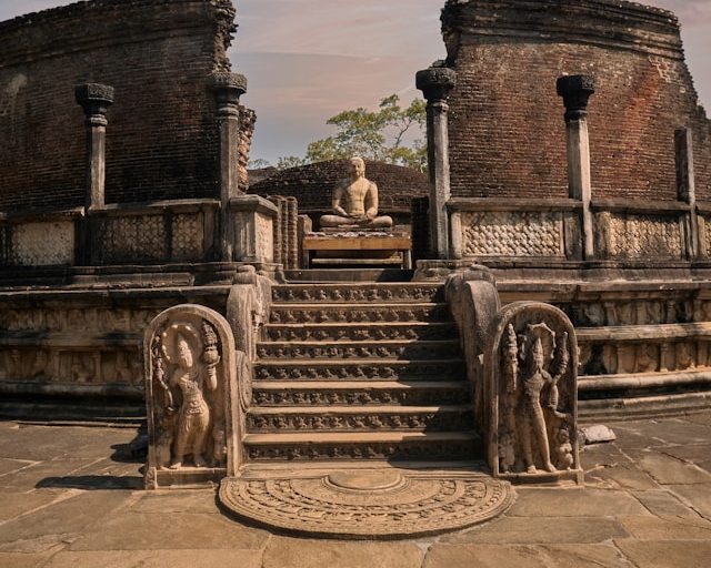 Ancient Vatadage ruins with a seated Buddha at Polonnaruwa