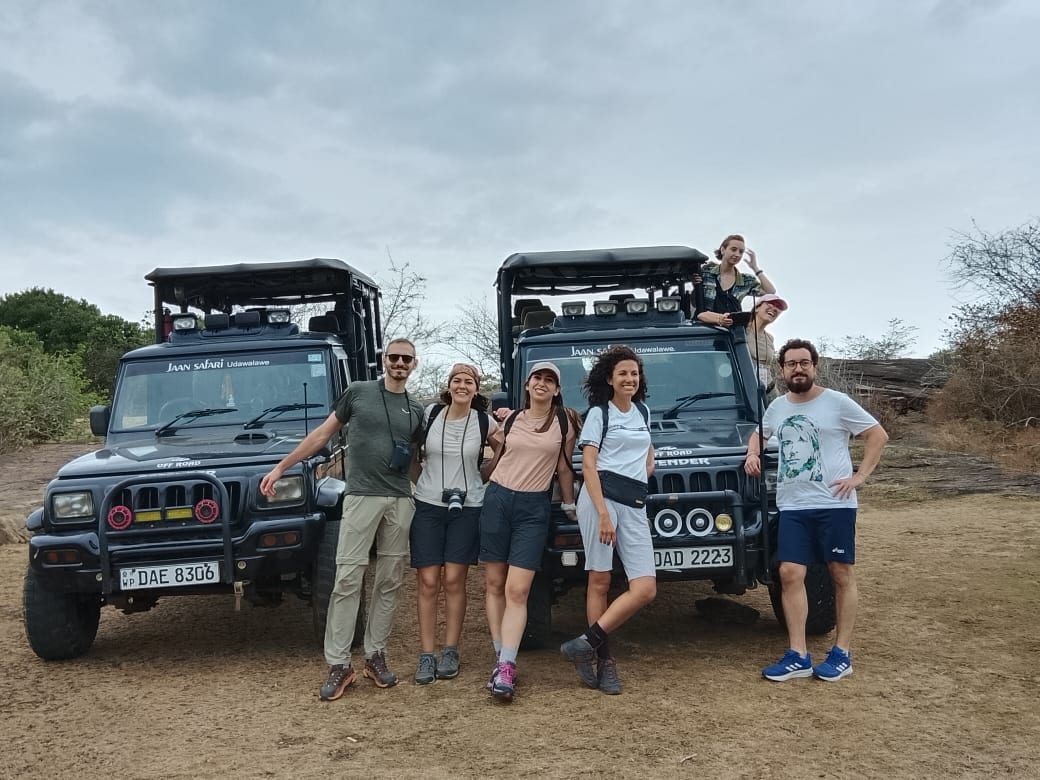 Francesca's group with safari jeeps in Sri Lanka