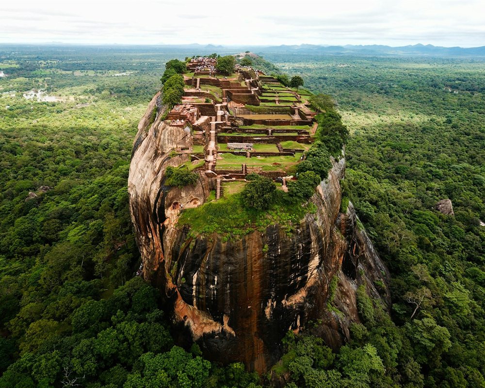 Aerial view of Sigiriya Rock Fortress and surrounding jungle